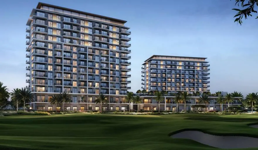 Luxury off-plan Dubai property apartment buildings overlooking landscaped golf community.