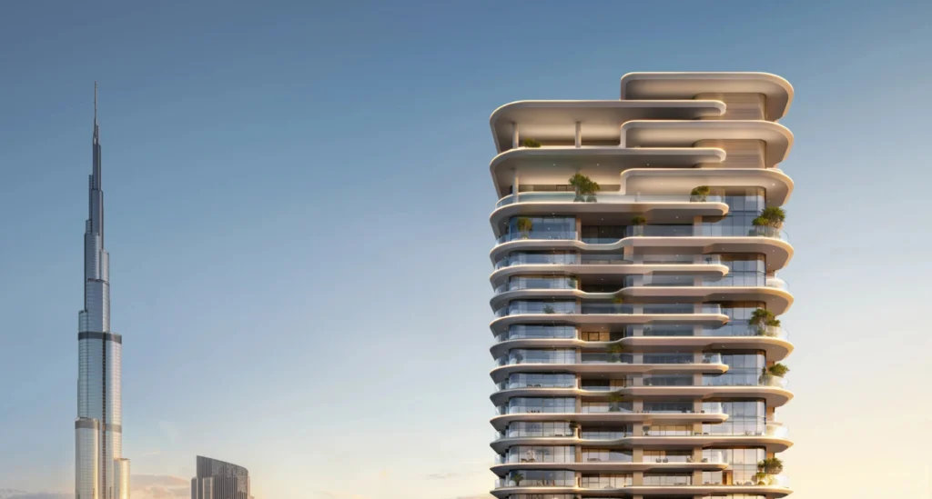 Luxury Dubai apartment tower with Burj Khalifa view representing opportunities to buy property in Dubai from Australia.