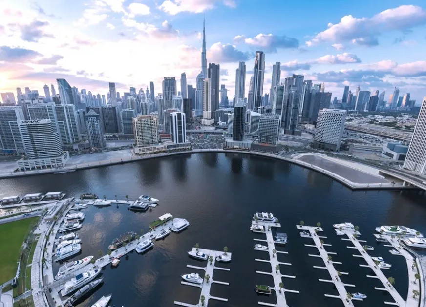 Dubai Marina skyline and luxury yacht harbor representing investment locations for Dubai Golden Visa through property.